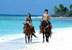 Horse riding on the beach.